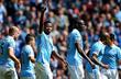 Футболисты Сити празднуют третий гол, getty images