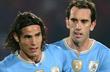 Диего Годин (справа) и Эдинсон Кавани, Getty images