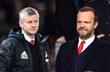 Оле-Гуннар Солскьяер (слева) и Эд Вудворд (справа)