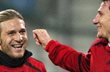 Фрайер поздравляет Воронина, kicker.de