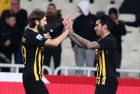 Дмитрий Чигринский (слева) отличился в матче с Олимпиакосом, фото: АЕК