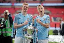 Кевин де Брюйне и Александр Зинченко, Getty Images