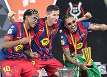 Ламін Ямаль, Роберт Левандовські та Рафінья, getty images