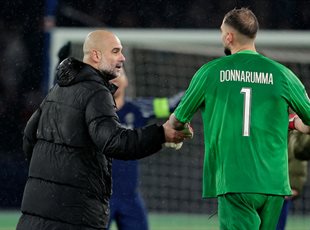 Хосеп Гвардіола та Джанлуїджі Доннарумма, getty images