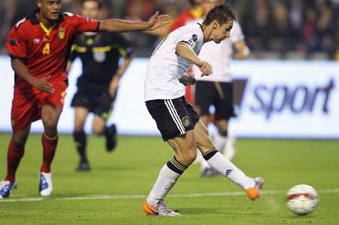 Клозе забивает бельгийцам, Reuters