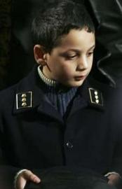 Алессио Рачити, сын убиенного, фото Reuters