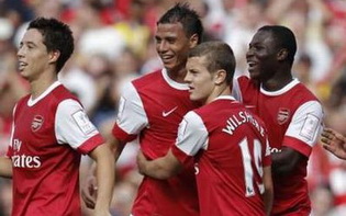 Уилшир со своей командой