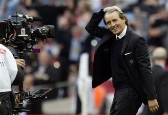 Роберто Манчини. А теперь улыбочку! Reuters