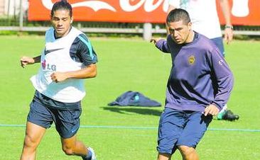 Вальтер Эрвити и Хуан Роман Рикельме, фото Ole