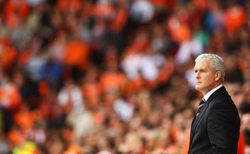 Большой человек на фоне маленьких, фото Getty Images