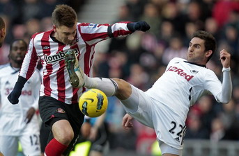 Бендтнер получает по мордасам, Getty images