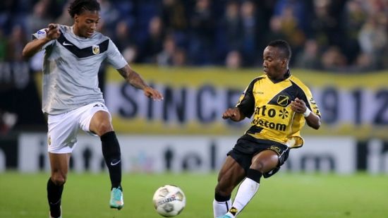 Патрик ван Аанхолт (слева), ANP