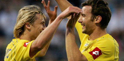 Максим Калиниченко (слева) опровергает слухи, АР