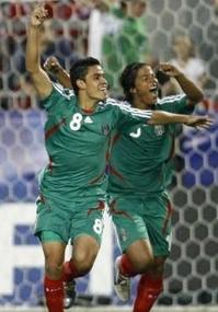 Баррера и Дос Сантос, фото Reuters