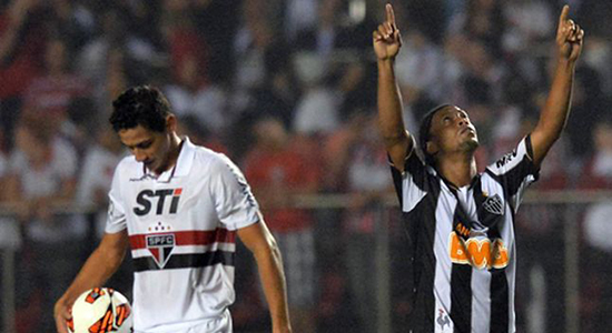 Гансо и Роналдиньо, AFP