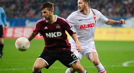 Симмонс (слева) сыграл за Нюрнберг 102 матча в Бундеслиге, Getty Images