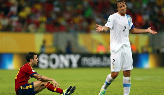 Сеск Фабрегас и Диего Лугано, Getty Images