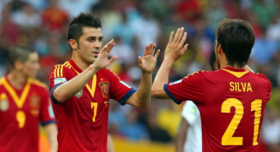 Давид Вилья и Давид Силва празднуют гол в ворота Таити, Getty Images