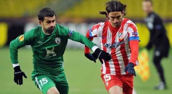 Кисляк в игре против Атлетико, Getty Images