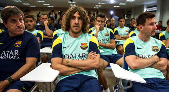 Карлес Пуйоль (в центре) на пресс-конференции, посвященной уходу Вилановы, Getty Images