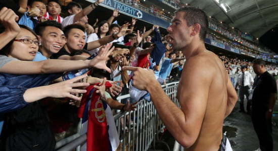 Александар Коларов и поклонники Манчестер Сити, Getty Images