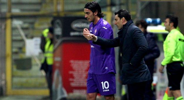 Винченцо Монтелла (справа) дает указания Альберто Аквилани, фото Getty Images