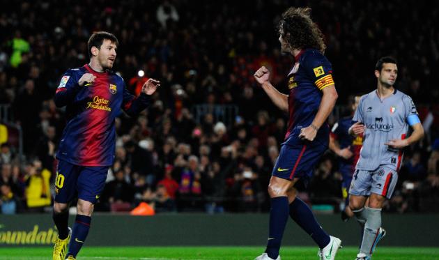 Лионель Месси и Карлес Пуйоль, Getty Images