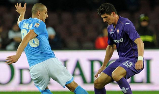 Гекхан Инлер и Марио Гомес, Getty Images