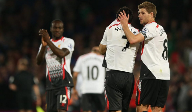 Джеррард успокаивает Суареса, Getty Images