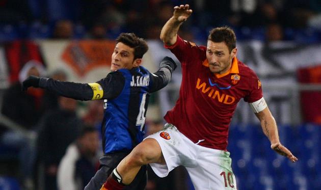 Хавьер Дзанетти и Франческо Тотти, Getty Images