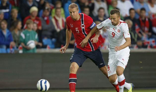 Бреде Хангеланд (слева), AFP