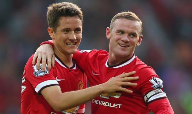 Руни поздравляет Эрреру с забитым голом, Getty Images