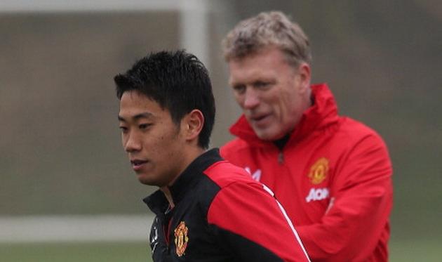 Синдзи Кагава и Дэвид Мойес, Getty Images