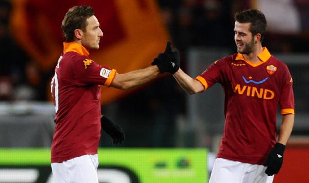 Миралем Пьянич и Франческо Тотти, Getty Images