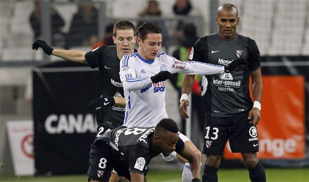 Товен в окружении игроков Метца, Getty Images