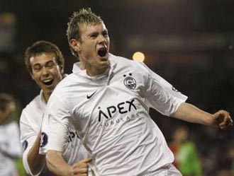 Шотландцы отмечают взятие ворот, Reuters