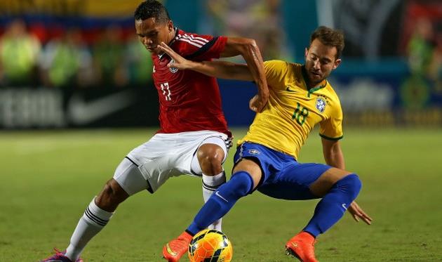 Эвертон Рибейро (справа) сыграл три матча за сборную Бразилии, Getty Images