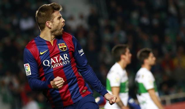 Пике открыл счет, фото JOSE JORDAN (AFP)