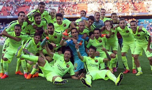 Празднующие игроки Барселоны, Getty Images