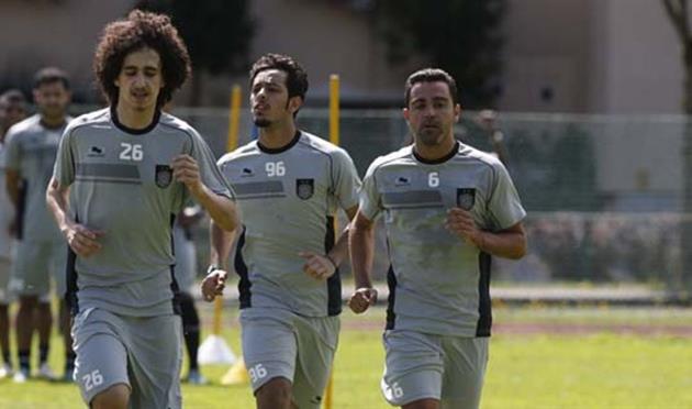 Хави (справа), al-saddclub.com