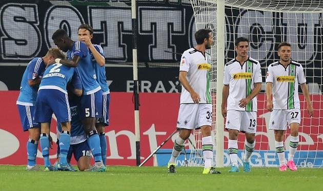 Игроки Гамбурга празднуют второе взятие ворот Боруссии М, gettyimages