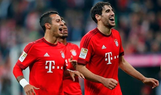 Тиаго Алькантара (слева) и Хави Мартинес (справа), Getty Images