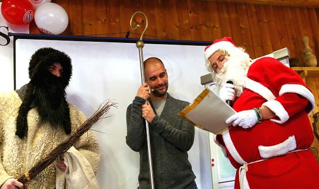 Гвардиола (в центре), Getty Images