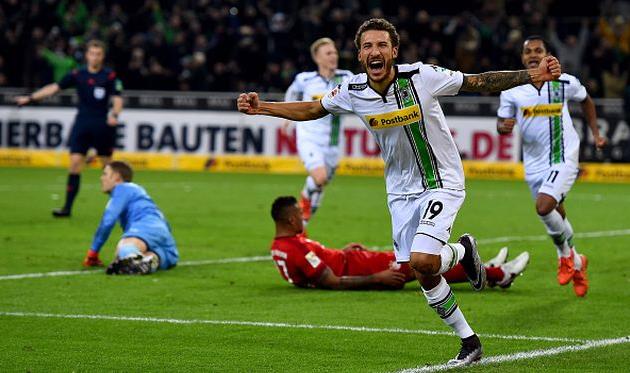 Джонсон празднует забитый гол в ворота Баварии, getty images