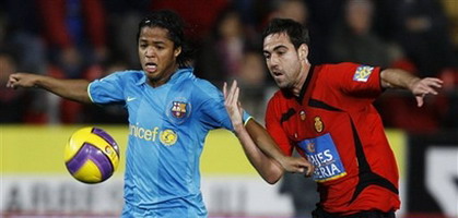 Воспитанники  каталонской кантеры: Дос Сантоса и Наварро, Reuters 