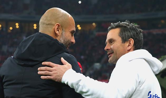 Хосеп Гвардиола (слева) и главный тренер Дармштадта Дирк Шустер, Getty Images