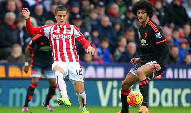 Маруан Феллаини (справа), Getty Images