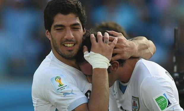 Луис Суарес и Диего Годин, AFP