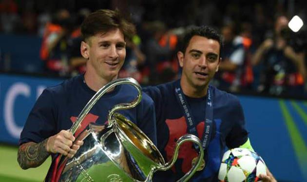 Лионель Месси и Хави, AFP