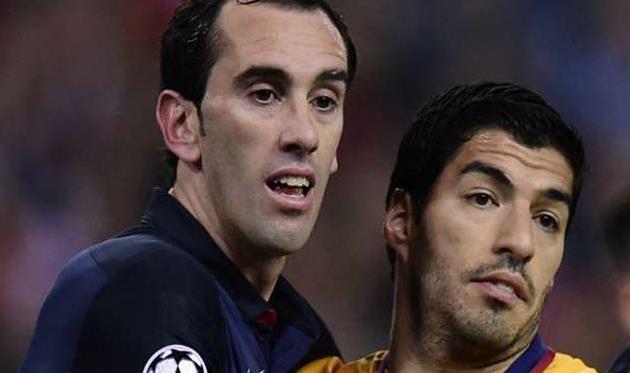 Годин и Суарес, AFP